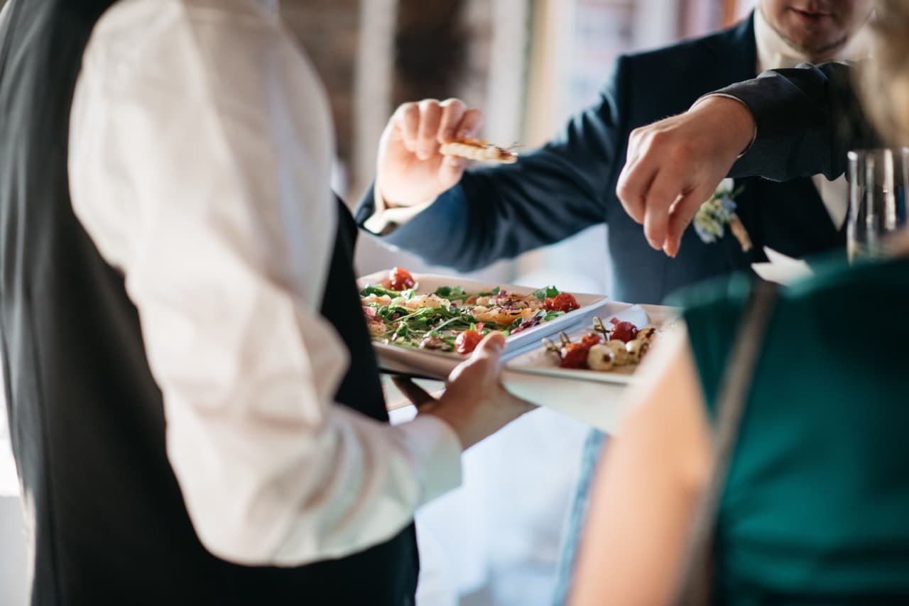 Holy Taste Events man serving a freshly prepared food to the guests 2025 02 02 21 23 17 utc